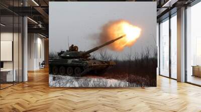 tank in battle field firing gun. Wall mural