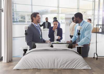 Business people interacting with each other at table during a seminar Wall mural