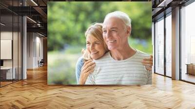 senior couple embracing outdoors Wall mural