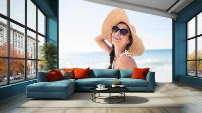  Portrait of smiling woman on the beach Wall mural