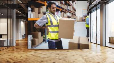  Worker carrying box with back ache Wall mural