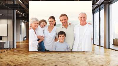 Beautiful family at the beach Wall mural