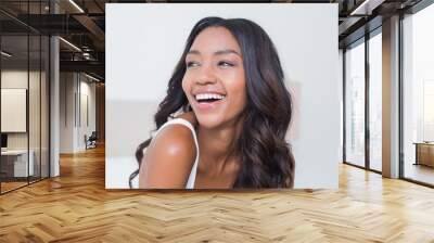 beautiful woman smiling on bed Wall mural