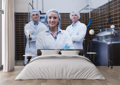 Biologist team standing smiling with arms crossed Wall mural