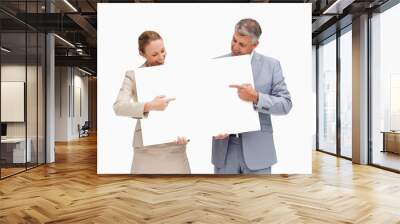 business people holding and pointing a poster Wall mural