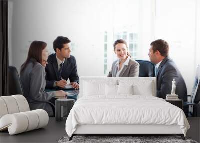 Businessmen and businesswomen talking during a meeting Wall mural