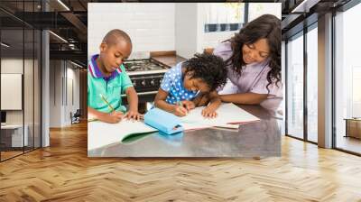 Children doing homework with their mother  Wall mural