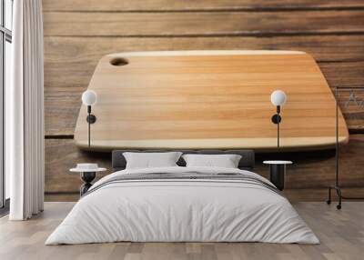 Chopping board on wooden table Wall mural