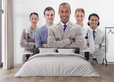 close-up of a business team smiling and crossing their arms Wall mural