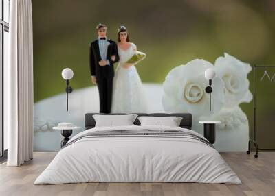 close-up of figurine couple on wedding cake Wall mural