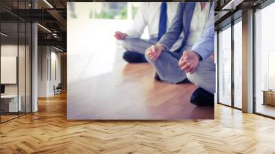 Close up view of business people doing yoga  Wall mural