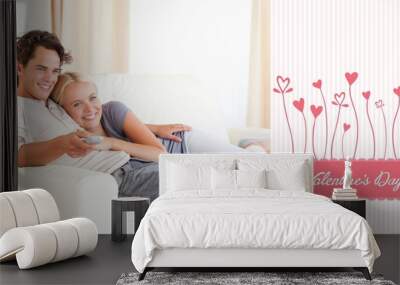 Composite image of cute valentines couple Wall mural