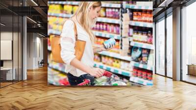 Customer looking at a product  Wall mural