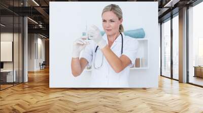 Doctor preparing syringe Wall mural