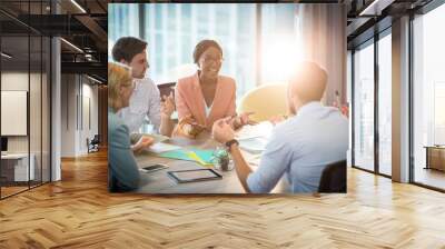 Group of business people discussing at desk Wall mural