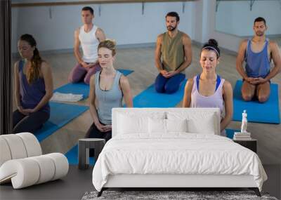 group of people performing yoga Wall mural