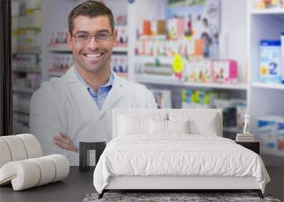 handsome pharmacist smiling at camera Wall mural