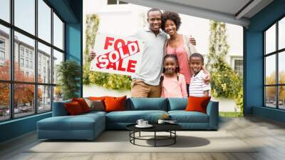 Happy african american family standing together Wall mural