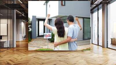 Happy couple after buying house Wall mural