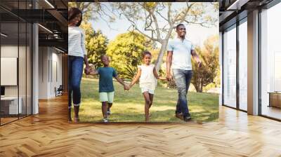 Happy family walking together Wall mural