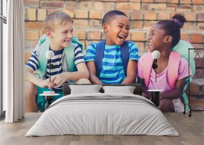 happy mixed race school kids sitting together on staircase Wall mural