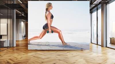 Highlighted bones of exercising woman Wall mural