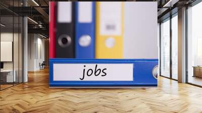 Jobs on blue business binder Wall mural