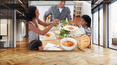 jolly family dining together Wall mural