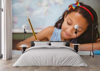 little girl writing book in classroom Wall mural