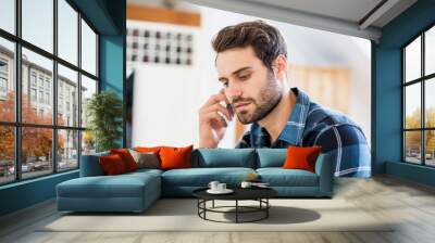 man talking on mobile phone Wall mural