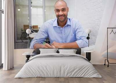 Man working at desk with computer and digitizer Wall mural