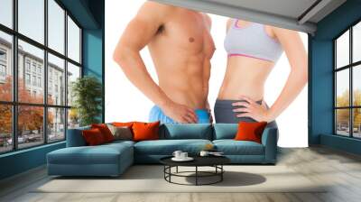 Mid section of a fit young couple Wall mural