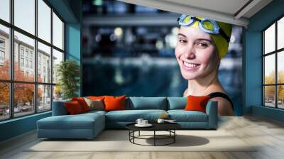 portrait of a woman swimmer looking the camera Wall mural