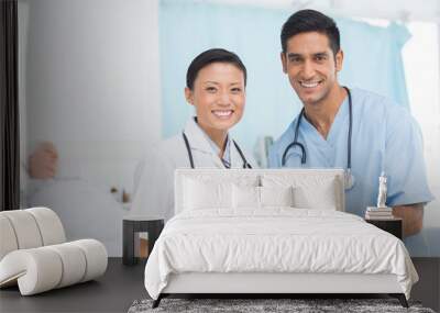 Portrait of confident doctors with arms crossed Wall mural