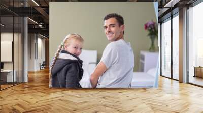 Portrait of daughter comforting her sick father Wall mural