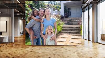 Portrait of family standing together Wall mural