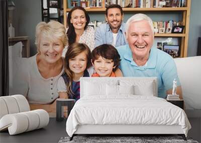 Portrait of happy family with grandparents Wall mural