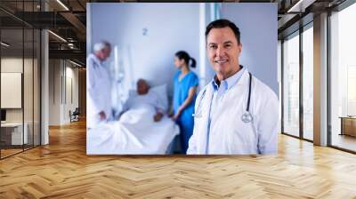 Portrait of male doctor smiling in the ward Wall mural