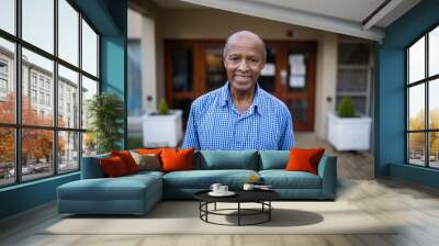 Portrait of smiling senior man at nursing home Wall mural