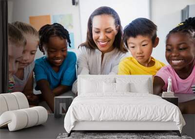 Portrait of teacher with pupil using tablet pc Wall mural