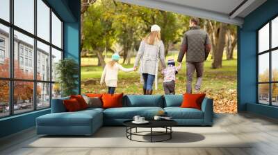 Rear view of a young family Wall mural