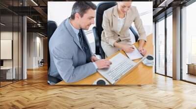 Smartly dressed colleagues in business meeting Wall mural