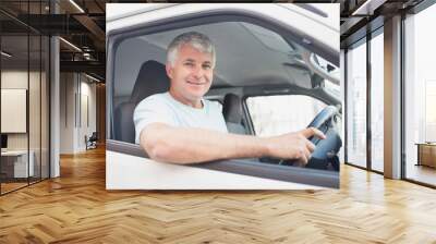 Smiling man driving van Wall mural