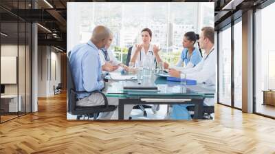 Team of doctors having a meeting Wall mural