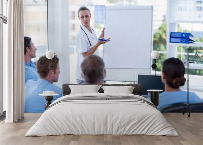 Team of doctors having brainstorming session Wall mural