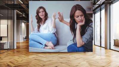 two female friends arguing with each other Wall mural