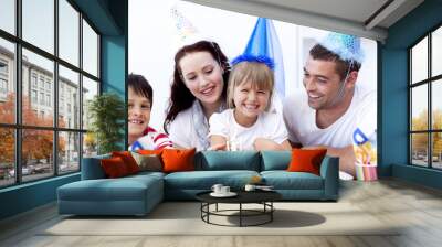 Young family celebrating a birthday Wall mural