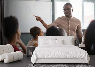 Black male teacher teaching  high school. Wall mural