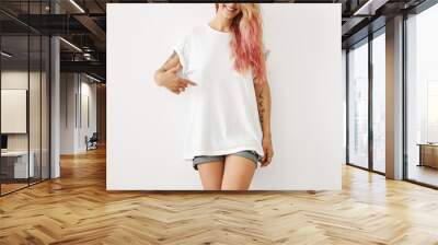 clothing, design, style, fashion and advertising. portrait of unrecognizable slim hipster girl with  Wall mural