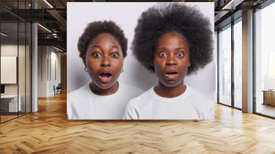 Collage image of six diverse people stare amazed and speechless feel frightened cannot believe own eyes have mouthes opened dressed in casual t shirts isolated over white background. Omg concept Wall mural